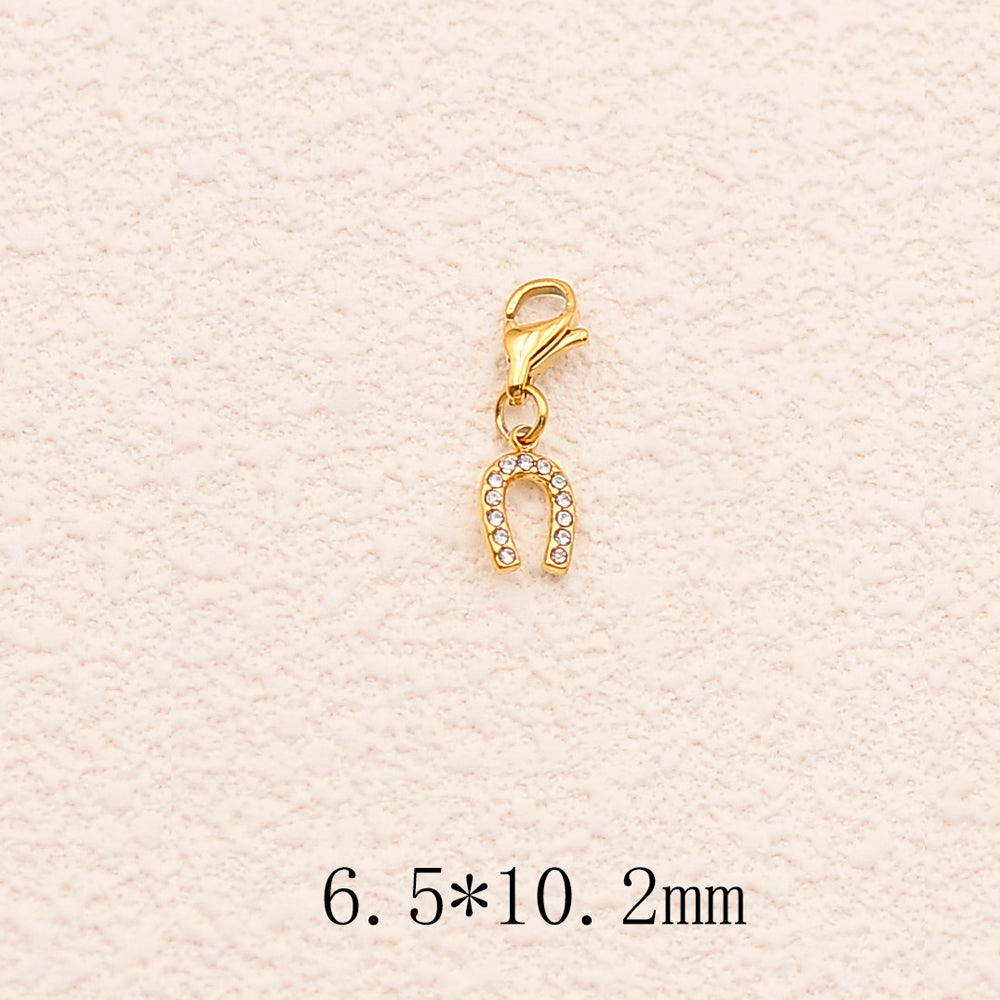 Charm - fer à cheval et oxydes de zirconium