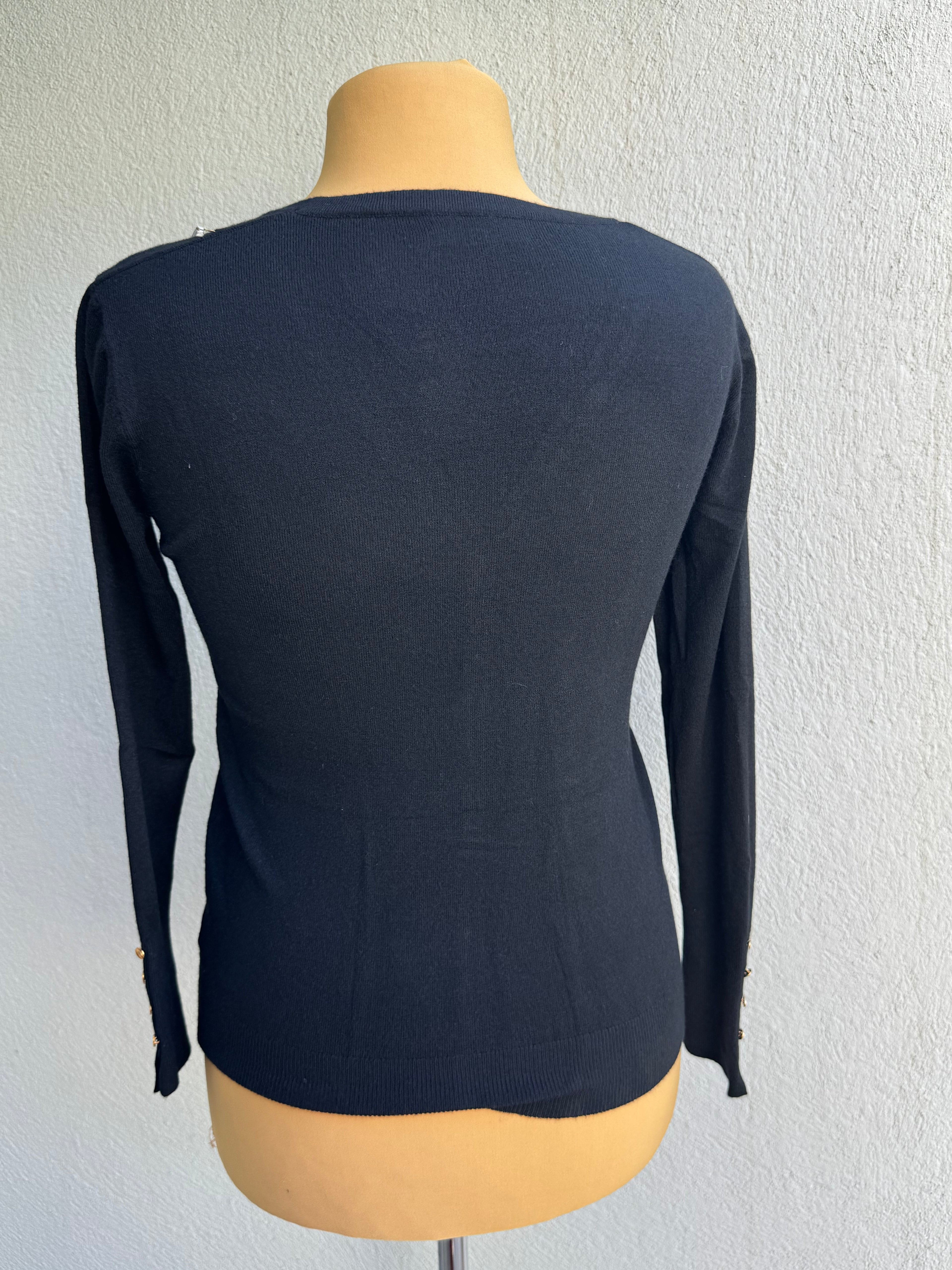 Gilet col V avec clou doré