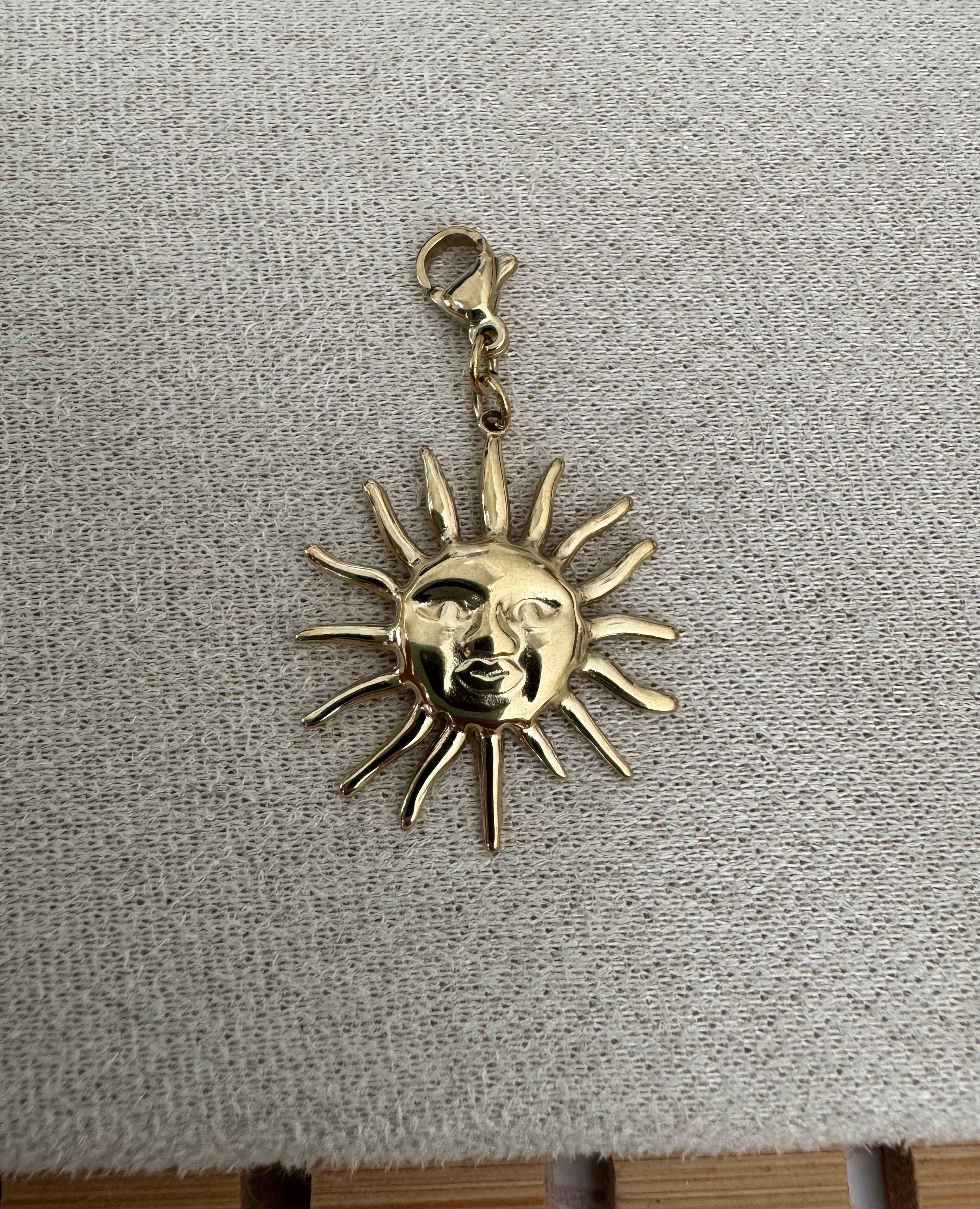 Charm soleil en acier inoxydable
